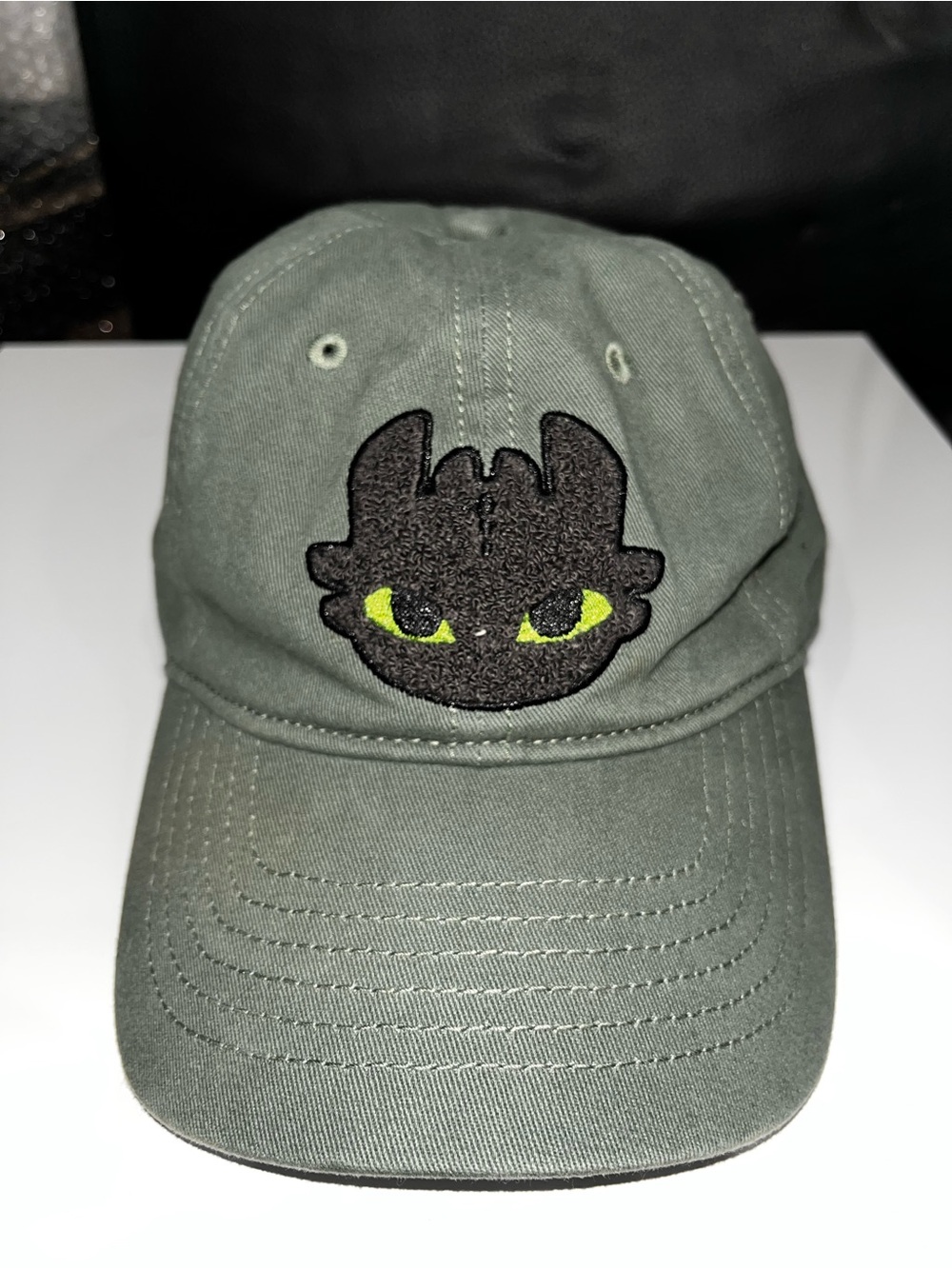 Dreamworks Olive Green Cap with Black Embroidered Dragon Face